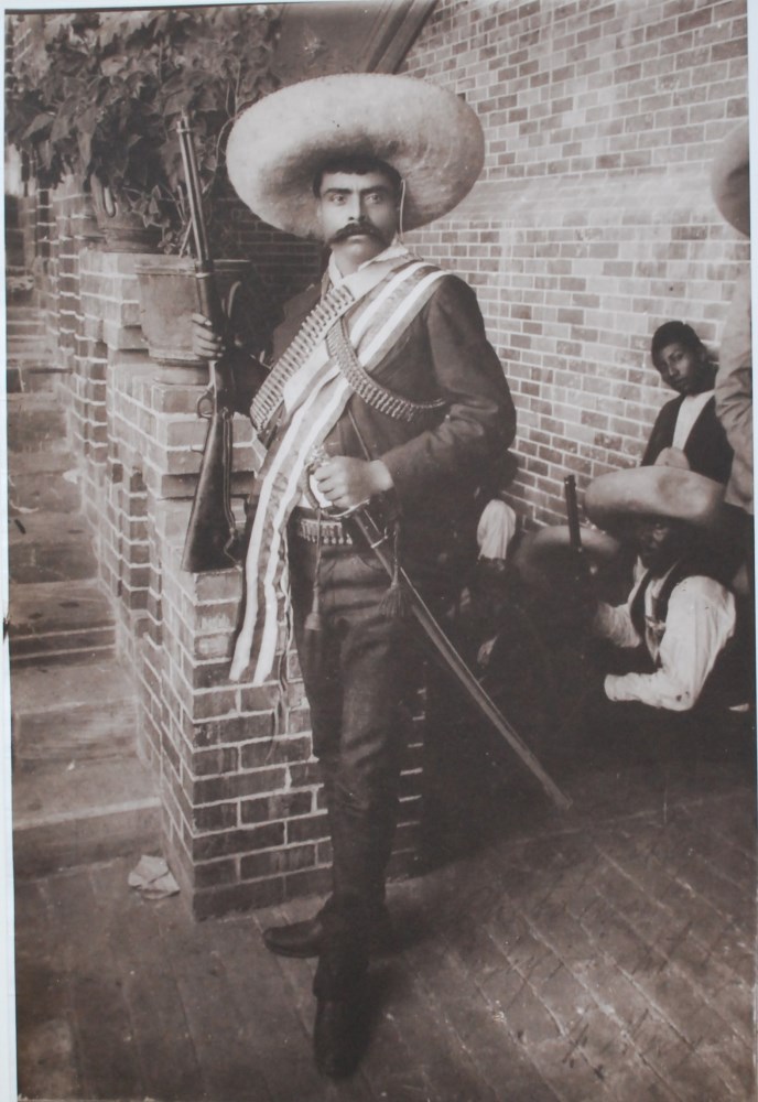 Lot #948: AGUSTIN VICTOR CASASOLA - Emiliano Zapata, Jefe del Ejercito Suriano, con Rifle y Sable - Gelatin silver print