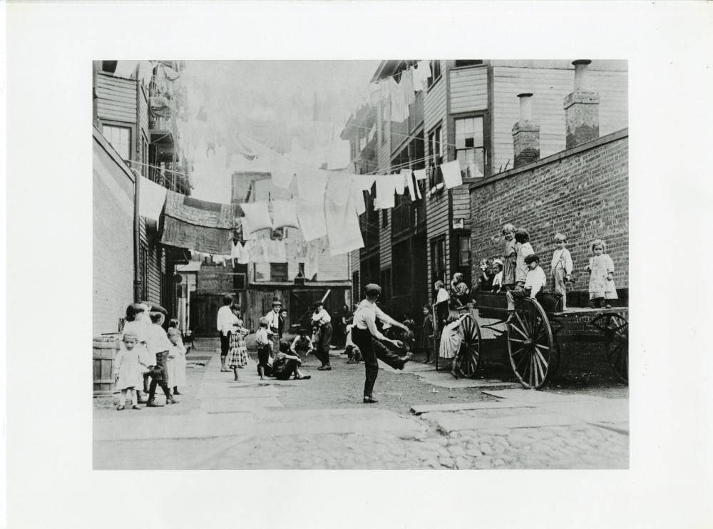 Lot #1702: LEWIS HINE - An Early Type of Playground for Tenement Children - Original photogravure