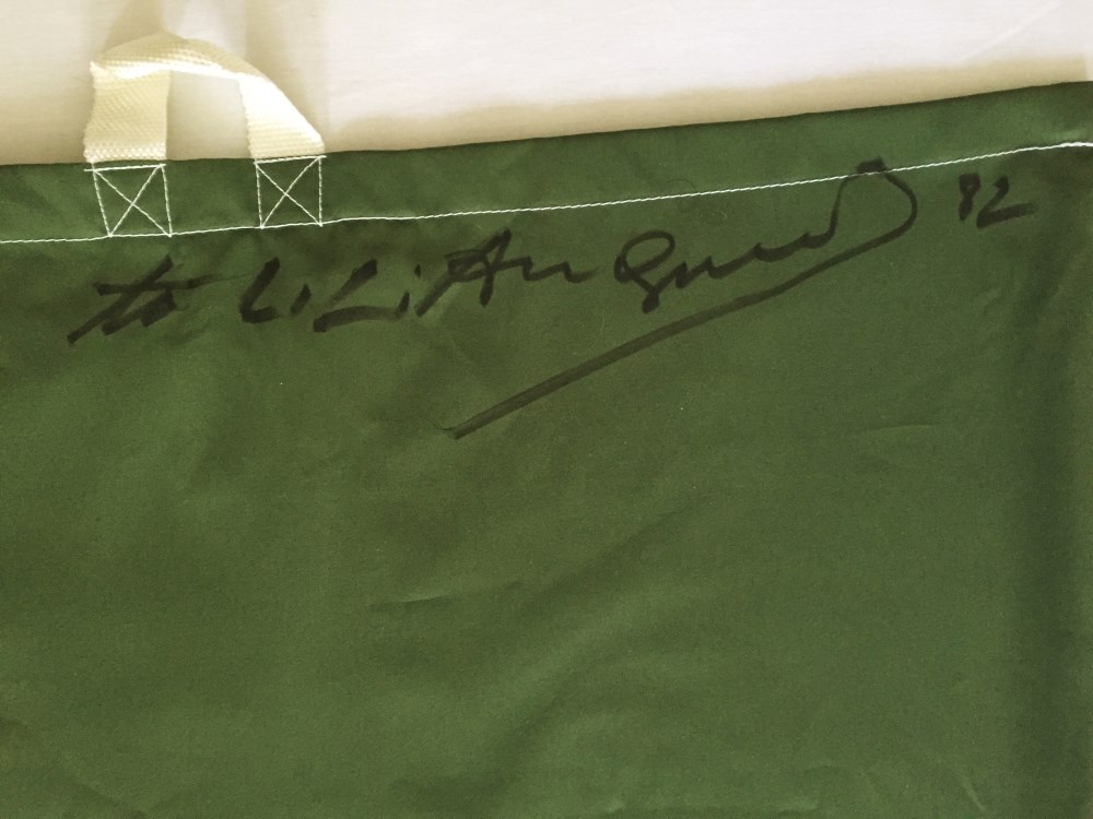 Lot #931: ANDY WARHOL - Dollar Sign - $ - Black marker drawing on green rip-stop nylon laundry bag
