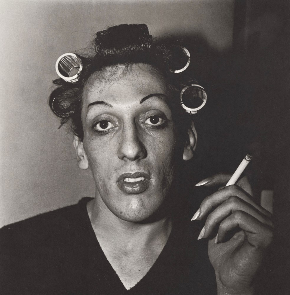 Lot #746: DIANE ARBUS - Young Man in Curlers at Home on West 20th Street, N.Y.C - Original vintage photogravure
