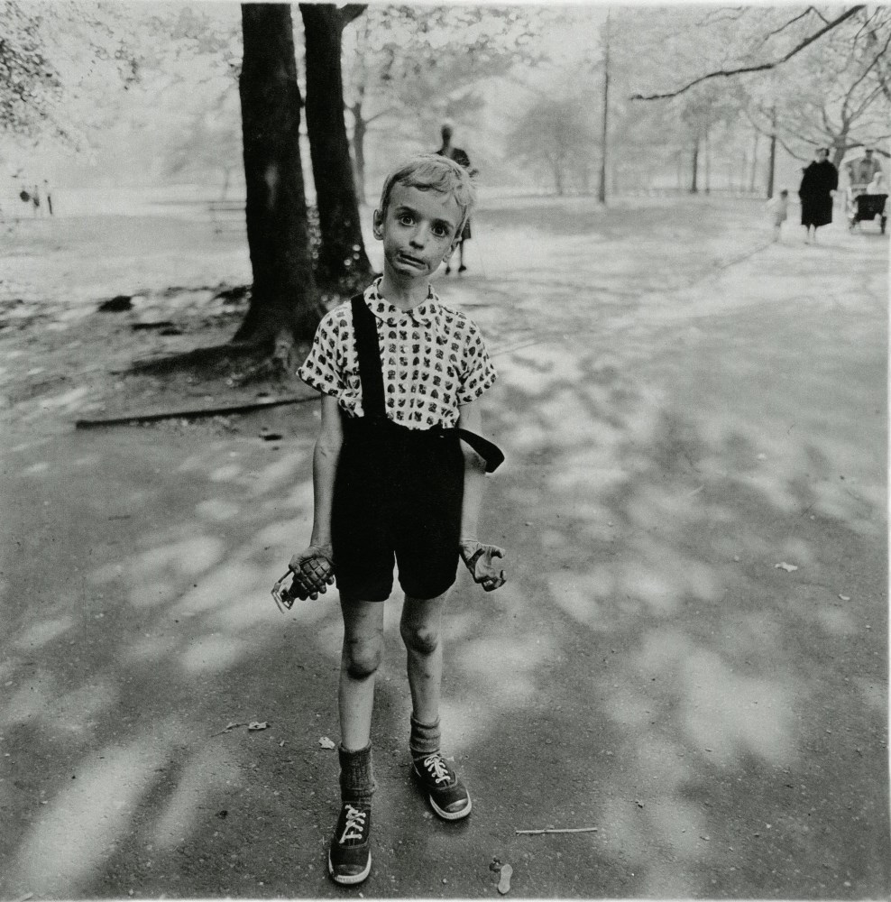 Lot #101: DIANE ARBUS - Child with a Toy Hand Grenade in Central Park, New York - Original vintage photogravure