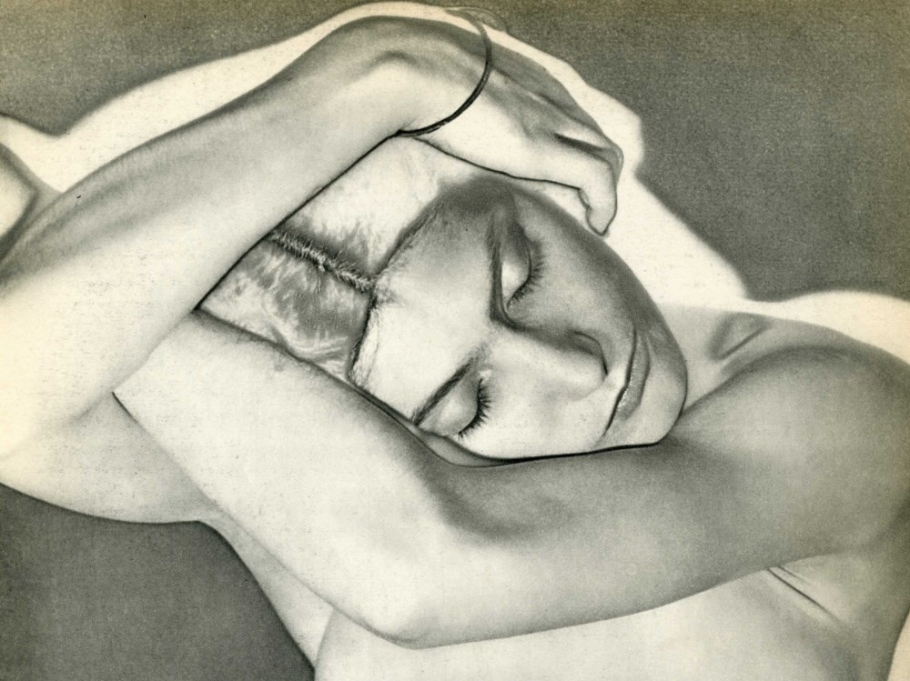 Lot #597: MAN RAY - Sleeping Woman (Woman on Folded Arms) - Original vintage photogravure